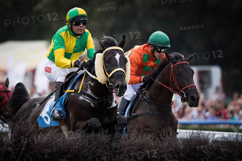 WROCLAW, POLAND - SEPTEMBER 4, 2016: Race for the 3-year and older horses Group IV at Racecourse WTWK Partynice. In action D. Andres (L) on the horse Tabor