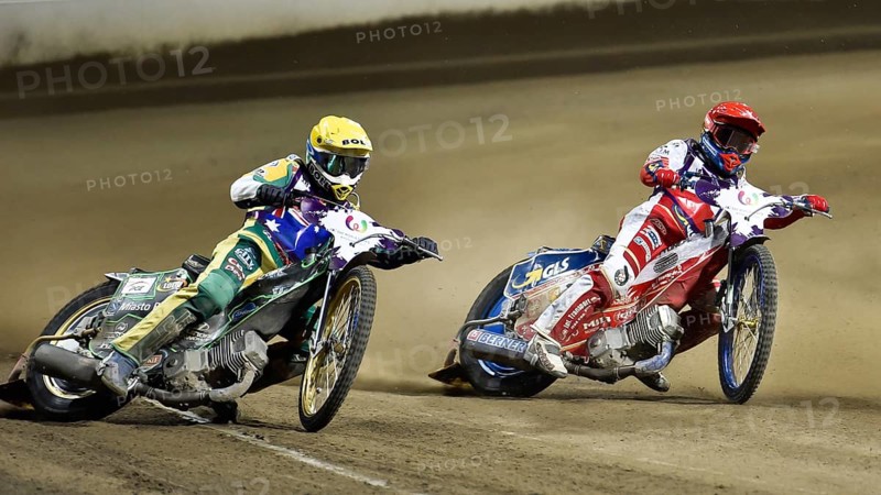 WROCLAW, POLAND - JULY 29, 2017: Speedway couple turnament race Poland - Australia during The World Games 2017. In action Max Fricke (Y) i Bartosz Zmarzlik (R) - final race