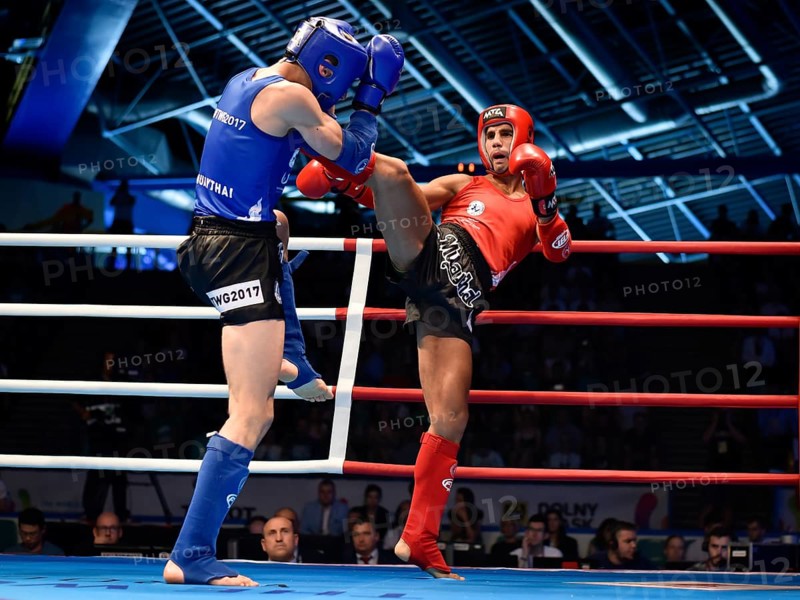 WROCLAW, POLAND - JULY 29, 2017: Muaythai fight during the The World Games 2017. Men fight Ahmad Ondash LBN (red) vs Oskar Siegert POL (blue)