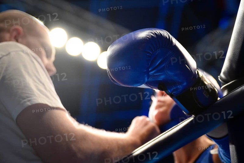 WROCLAW, POLAND - JULY 29, 2017: Muaythai fight during the The World Games 2017. Hand of Aleksandr Abramov (RUS) on the ring rope after the fight with Wiwat Khamtha (THA)
