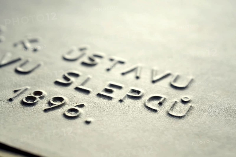 Word blind in Czech language embossed writing letters for blind people used before Braille writing system