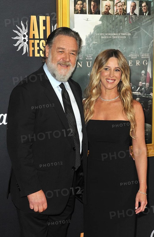 Russell Crowe and Britney Theriot at the 2025 AFI FEST - 'Nuremberg' Premiere held at the TCL Chinese Theater in Hollywood, USA on on October 24, 2025, Los Angeles, CA, USA, Hollywood, California, USA