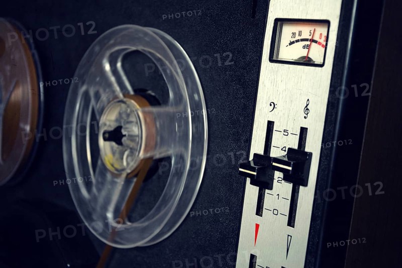 Filtered vintage picture of reel-to-reel audio recorder