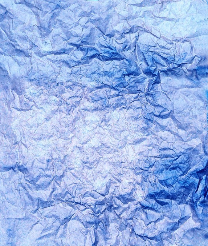 A Burnt and wrinkled Paper Background. Backdrop
