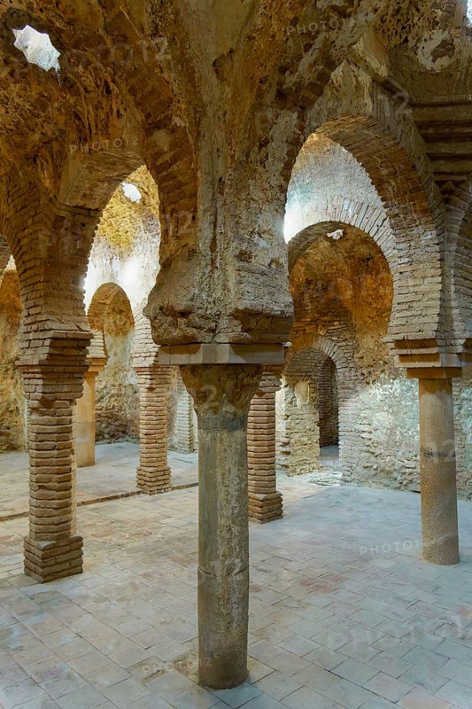 Ronda, malaga, spain Ancient arab baths (hammam) historical structure in ronda, spain, showing brick arches and stone columns