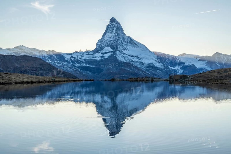 Matterhorn Mountain and Reflection in Lake Stellisee in Evening. Swiss Alps. Valais, Switzerland