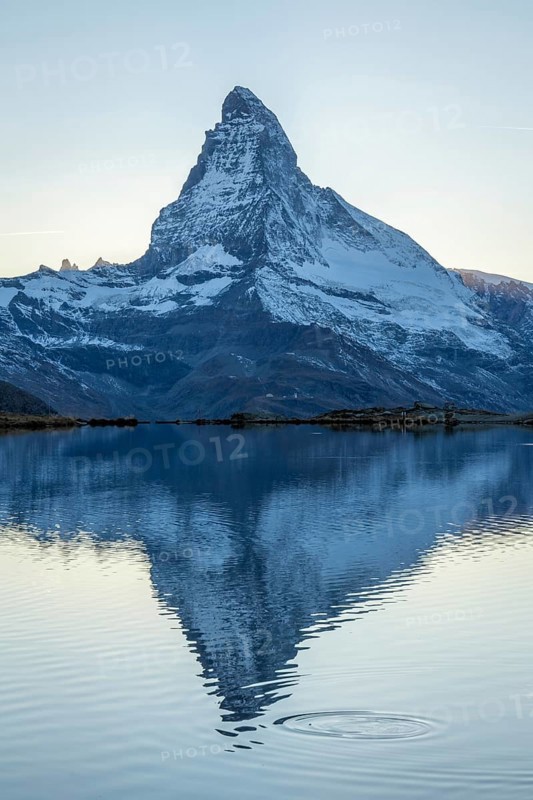Matterhorn Mountain and Reflection in Lake Stellisee in Evening. Swiss Alps. Valais, Switzerland