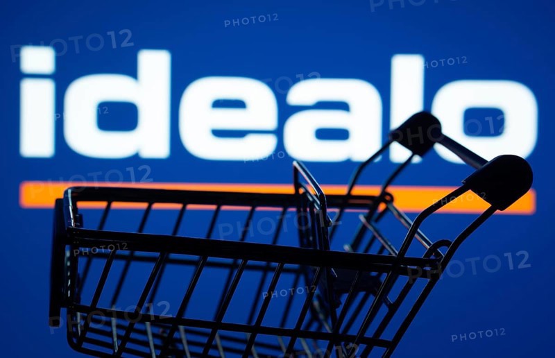 Dhaka, Bangladesh- 03 July 2025: Silhouette of a shopping cart in front of the idealo logo, symbolizing ecommerce and online shopping