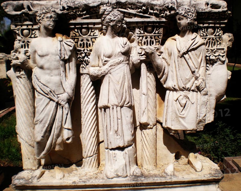 An ancient relief composition with antique statues (an archaeological find from the Ancient Greek era) in the pavilion of the History Museum. A famous landmark on the Mediterranean coast of Antalya Province. Antalya, Turkey