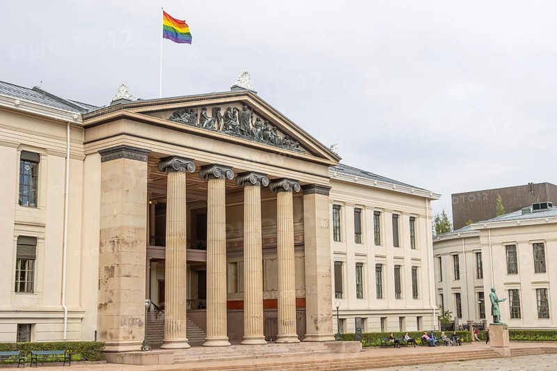 Domus Media, the University of Oslo building belonging to the Faculty of Law, where the Nobel Peace Prize used to be awarded in the past. It stands on University Square, near Karl Johans gate in the city centre. The rainbow flag, the LGBT pride flags, is hoisted at the top for the Oslo Pride summer festival. Oslo, Østlandet, Norway