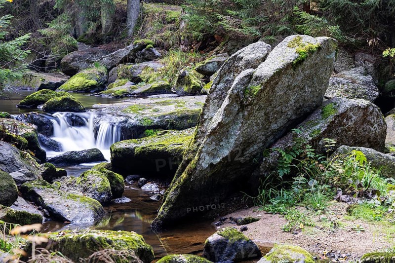 A stream flows over large, moss-covered stones and creates a peaceful atmosphere, Höllfall Arbesbach Waldviertel Lower Austria Austria