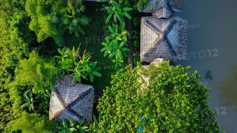 Nature resort next to a river in Vietnam, Asia, seen from above