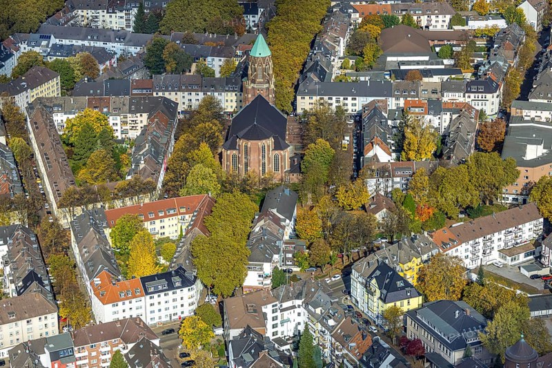 Aerial view, residential area with Catholic Church of St. Mary's Conception, autumn trees and tree avenue, Holsterhausen, Essen, Ruhr region, North Rhine-Westphalia, Germany, place of worship, colorful trees, trees in autumn colors, DE, Europe, religious community, church, land tax, holy place, autumn colors, autumn mood, real estate, church, parish, denomination, aerial photography, aerial photography, religion, religious site, overview, bird's eye view, residential complex, housing and living, residential area, residential quality, residential district, residential district, birds-eyes view, autumnal tree avenue, autumnal trees, overview
