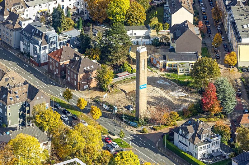 Aerial view, demolition of the evangelical reconciliation church, planned retirement home with daycare center, free-standing church tower, Rüttenscheid, Essen, Ruhr region, North Rhine-Westphalia, Germany, retirement home, construction work, building area, building land, building plots, construction project, construction site, DE, Europe, kindergarten, day care center, daycare center, aerial photography, aerial photography, new building, retirement home, retirement home, retirement home, senior center, tower, overview, bird's eye view, birds-eyes view, overview