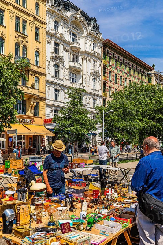 Antique and flea market, on the Chain Bridge south of the Naschmarkt, behind the historic facades of the buildings on the left Wienzeile, Vienna, Austria