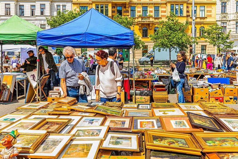 Antique and flea market, on the Chain Bridge south of the Naschmarkt, behind the historic facades of the buildings on the left Wienzeile, Vienna, Austria