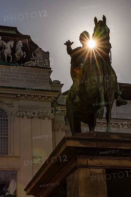 Sunbeams over the equestrian statue of Emperor Joseph II, Josefsplatz, Vienna, Austria