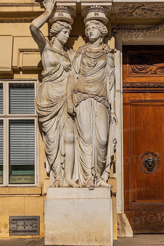 Women as supporting marble statues at a historic building, Josefsplatz, Vienna, Austria