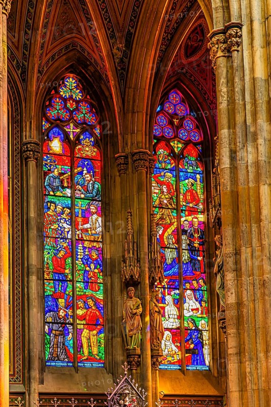 Colourful windows in the neo-gothic votive church, Vienna, Austria