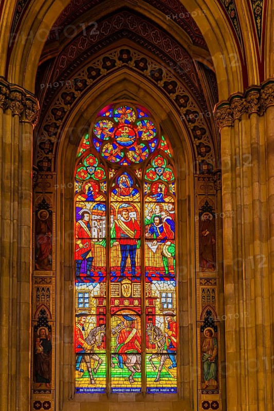 Colourful window in the neo-gothic votive church, Vienna, Austria