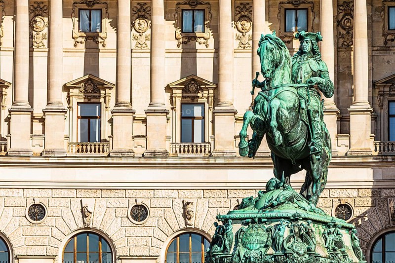 Monument to Prince Eugene, behind it the historic façade of the New Hofburg Imperial Palace, Heldenplatz, Vienna, Austria