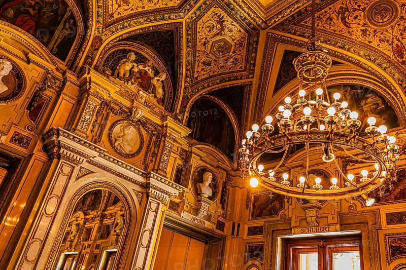 Sumptuous room and chandelier in the Vienna State Opera, Vienna, Austria