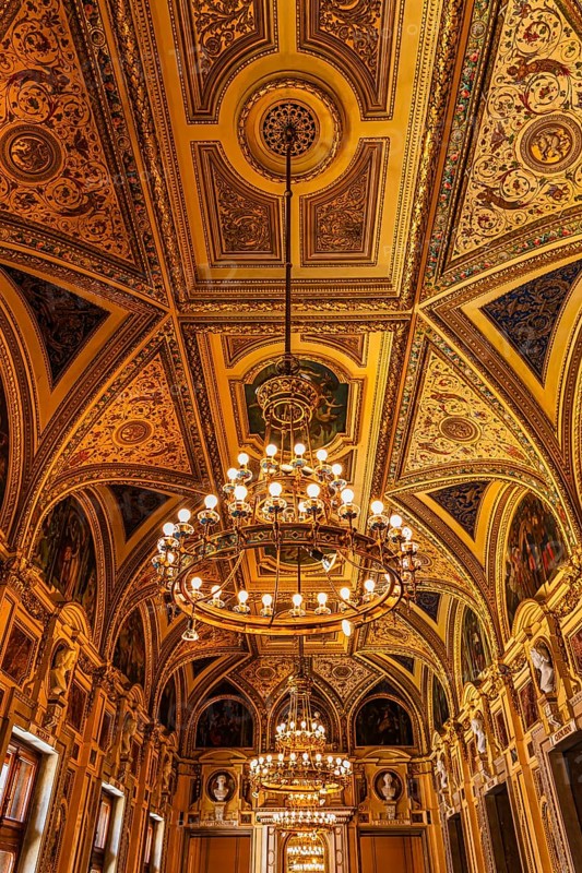 Sumptuous room and chandelier in the Vienna State Opera, Vienna, Austria