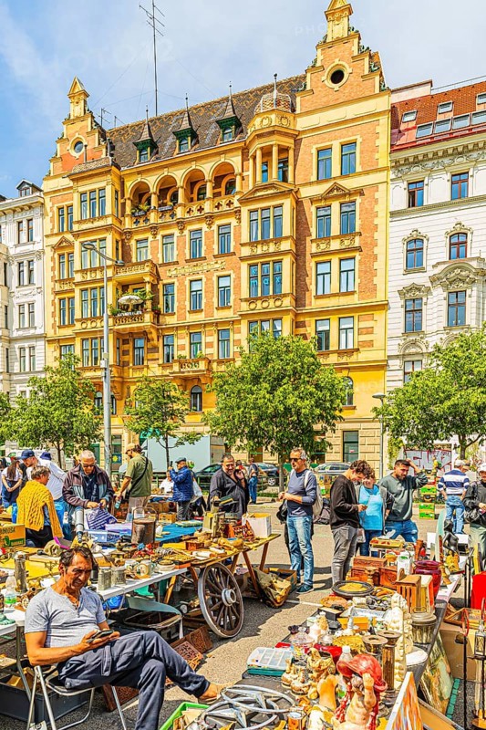 Antique and flea market, on the Chain Bridge south of the Naschmarkt, behind the historic facades of the buildings on the left Wienzeile, Vienna, Austria