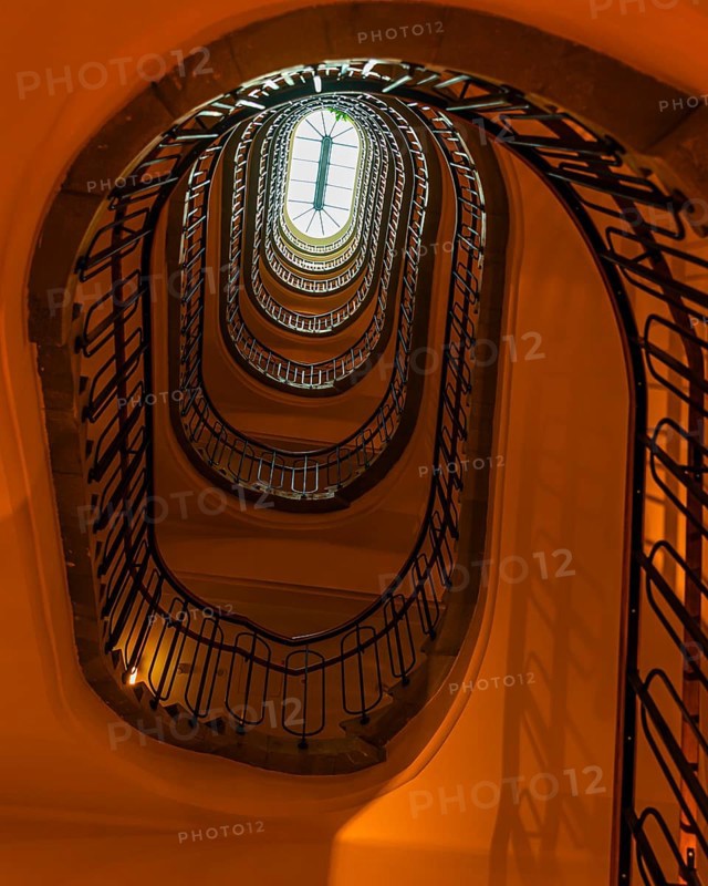 Staircase in an old Viennese house, view from below, Vienna, Austria