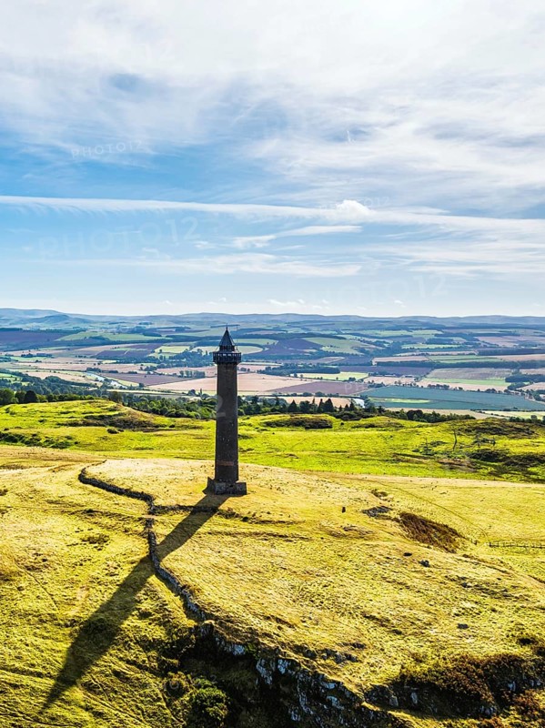 Waterloo Monument over Scottish fields and farms from a drone, Jedburgh, Scotland, UK
