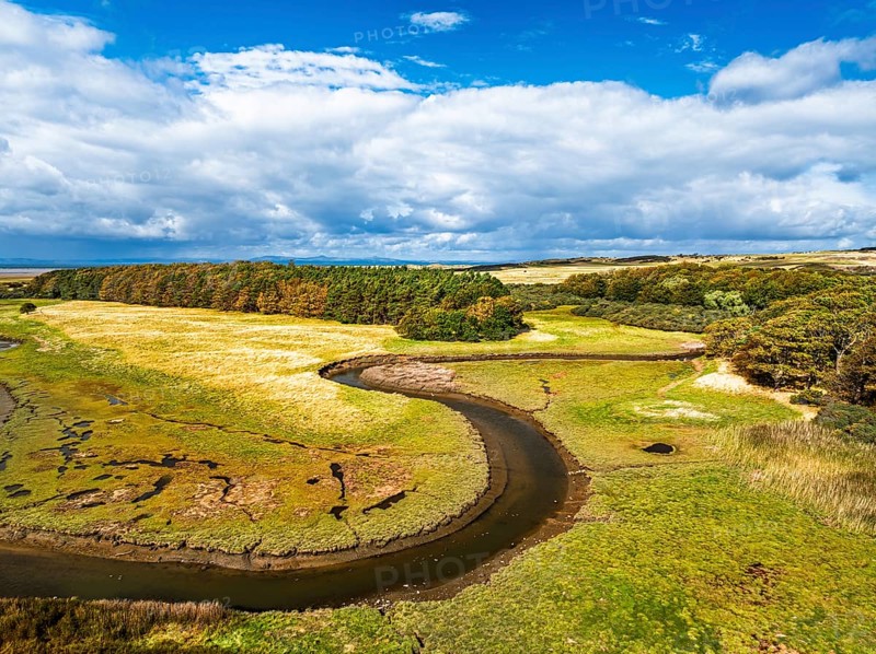 Marshes over Aberlady Bay and Peffer Burn from a drone, Luffness Castle, Aberlady, East Lothian, Scotland, UK