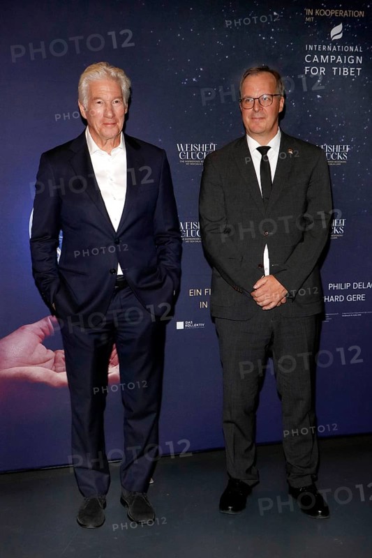 Richard Gere and Kai Müller (managing directors of International Campaign for Tibet) at a photo call in front of the presentation of the documentary about the life of the Dalai Llama, WISDOM OF HAPPINESS whose executive producer he is, at the Kulturbrauerei in Berlin on 24.10.2025