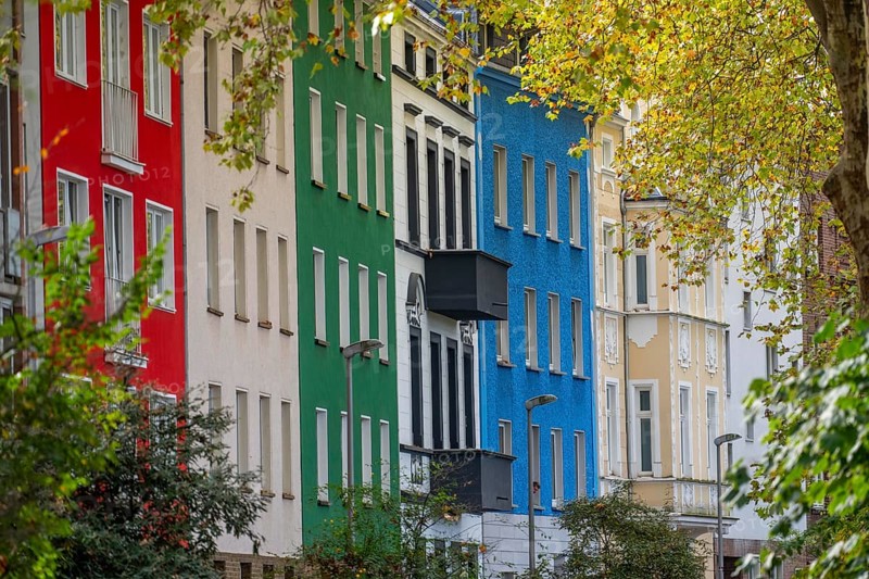 Residential buildings in Düsseldorf-Bilk, facades with different colors, rental apartments, past, North Rhine-Westphalia