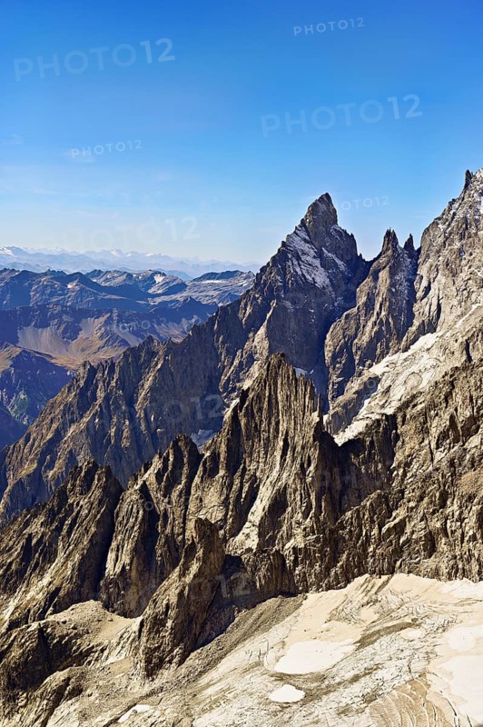 View of the mountain l'Aiguille Noire de Peuterey, in the back the Italian Alps, Pointe Helbronner viewing terrace, Chamonix-Mont-Blanc, Haute-Savoie, Italy watershed, France