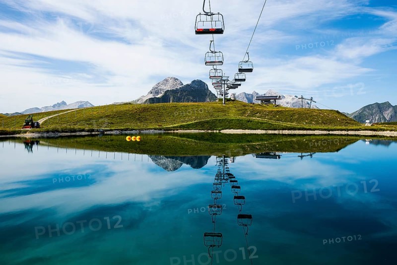 Mountain landscape with reservoir and chairlift, Saloberkopf, Warth, Bregenzerwald, Vorarlberg, Alps, Austria
