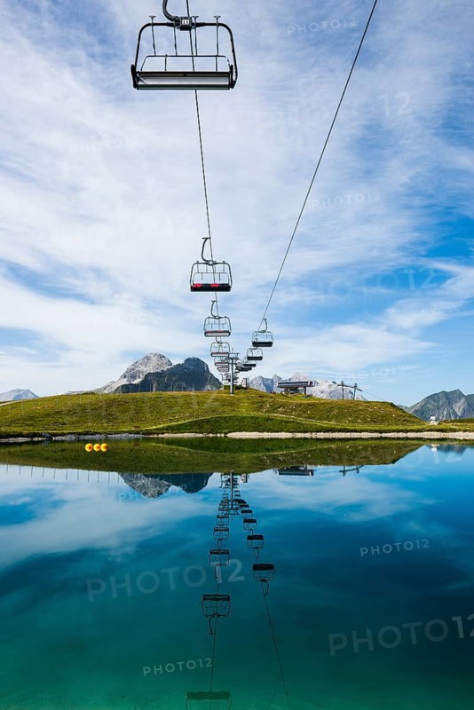 Mountain landscape with reservoir and chairlift, Saloberkopf, Warth, Bregenzerwald, Vorarlberg, Alps, Austria