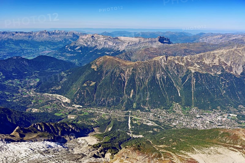 View from the Aiguille du Midi mountain station observation deck into the valley with the city, Chamonix-Mont-Blanc, Haute-Savoie, France