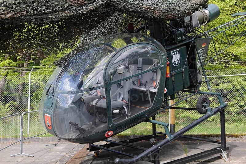 Disused small light helicopter helicopter Alhouette II from the Federal Border Guard in the Point Alpha open-air museum on the former inner German border between FRG West Germany and GDR Eastern Bloc, Point Alpha Memorial, former zone border, Rasdorf, Hesse, Geisa, Thuringia, Germany