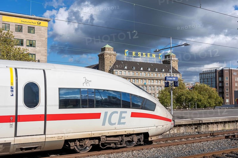 ICE train on track 2 in Essen main station, view of the city center, Handelshof building with Essen lettering, North Rhine-Westphalia, Germany