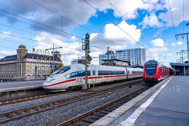ICE train on track 2 in Essen main station, regional express, view of the city center, Handelshof building with Essen logo, North Rhine-Westphalia, Germany