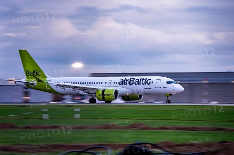 AirBaltic Airbus A220 landing at Düsseldorf Airport, North Rhine-Westphalia, Germany