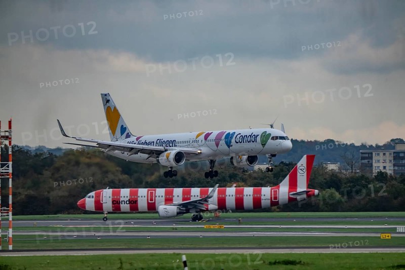 Condor aircraft landing and waiting for takeoff at Düsseldorf Airport, North Rhine-Westphalia, Germany