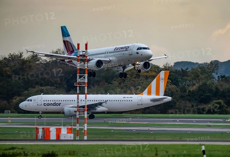 Eurowings Airbus landing at Düsseldorf airport, Condor Flieger waiting for takeoff, North Rhine-Westphalia, Germany
