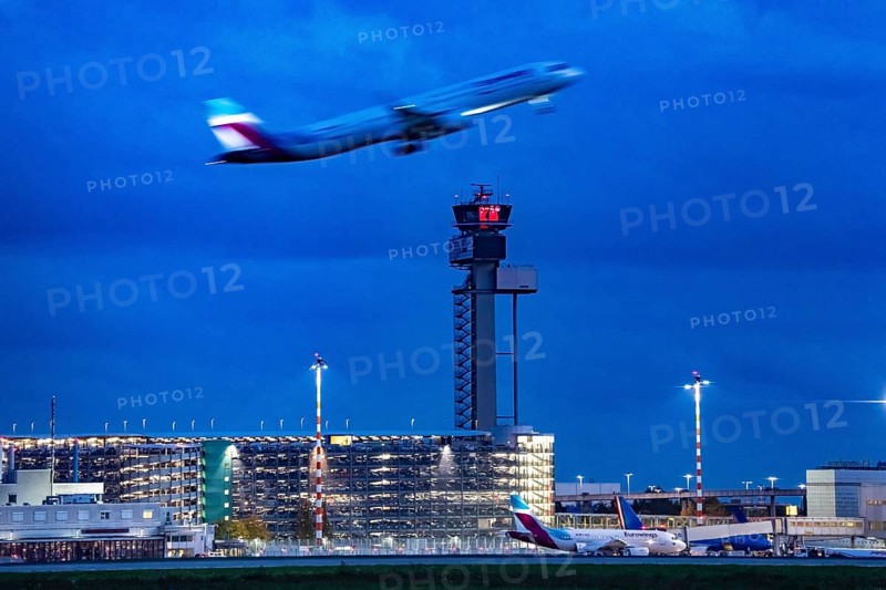 Airplane taking off from Düsseldorf Airport, Air Traffic Control Tower, North Rhine-Westphalia, Germany