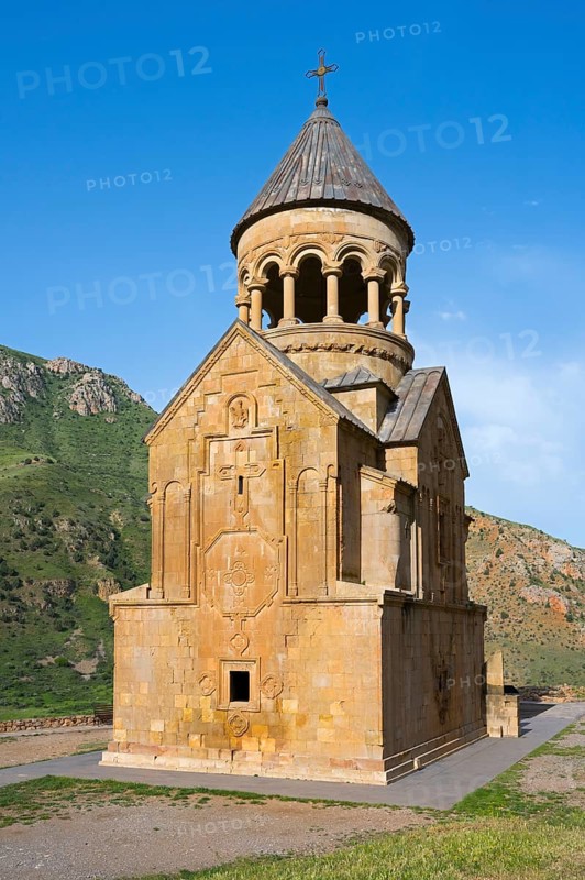 A church with ornate stone architecture against a clear blue sky, Noravank monastery, Surb Astvatsatsin mausoleum church, Noravank, Vayots Dzor province, Wajoz Dzor, Armenia, Caucasus