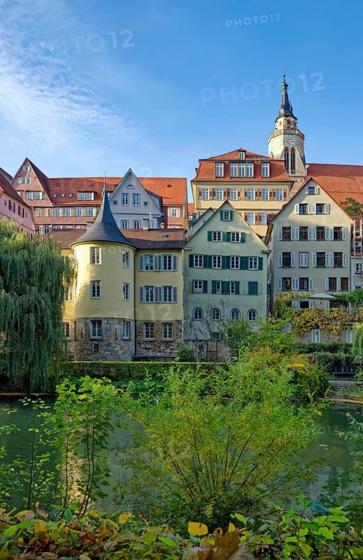 Hölderlin Tower, the poet Johann Christian Friedrich Hölderlin lived in the tower room, historic houses on the Neckar front, the Neckar river with poking and water reflection, old town of Tübingen, Baden-Württemberg, Germany