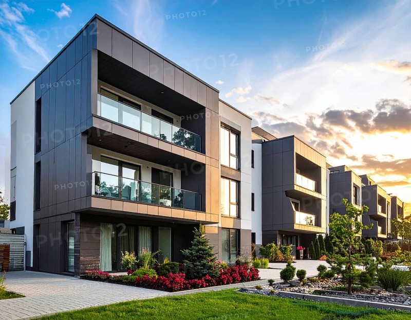 New modern block of flat, condo architecture, Residential apartment as a flat, luxury house complex, City real estate property, green garden plants in front, clear blue sky with golden evening light, AI generated