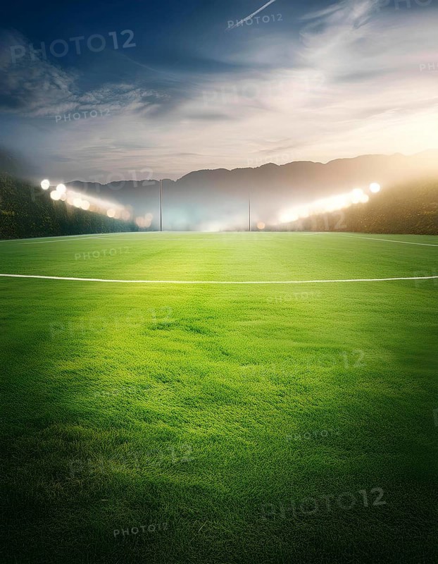 A soccer field with a bright green grass and a cloudy sky. The field is empty and the only light source is the sun, AI generated