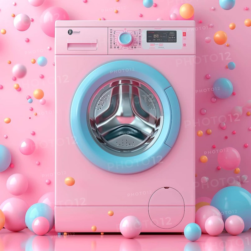 Pink washing machine on a background of colorful balls, AI generated