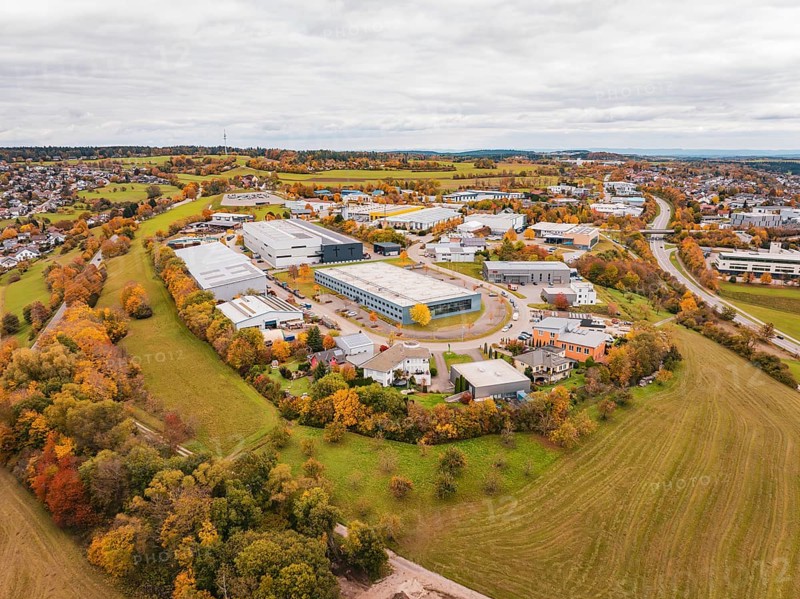 Bird's eye view of industrial buildings and fields in autumn weather, Dornstetten, Freudenstadt district, Germany